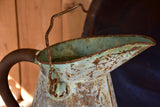 Antique French watering can with aqua patina
