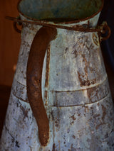 Antique French watering can with aqua patina