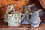 Collection of four antique French watering cans