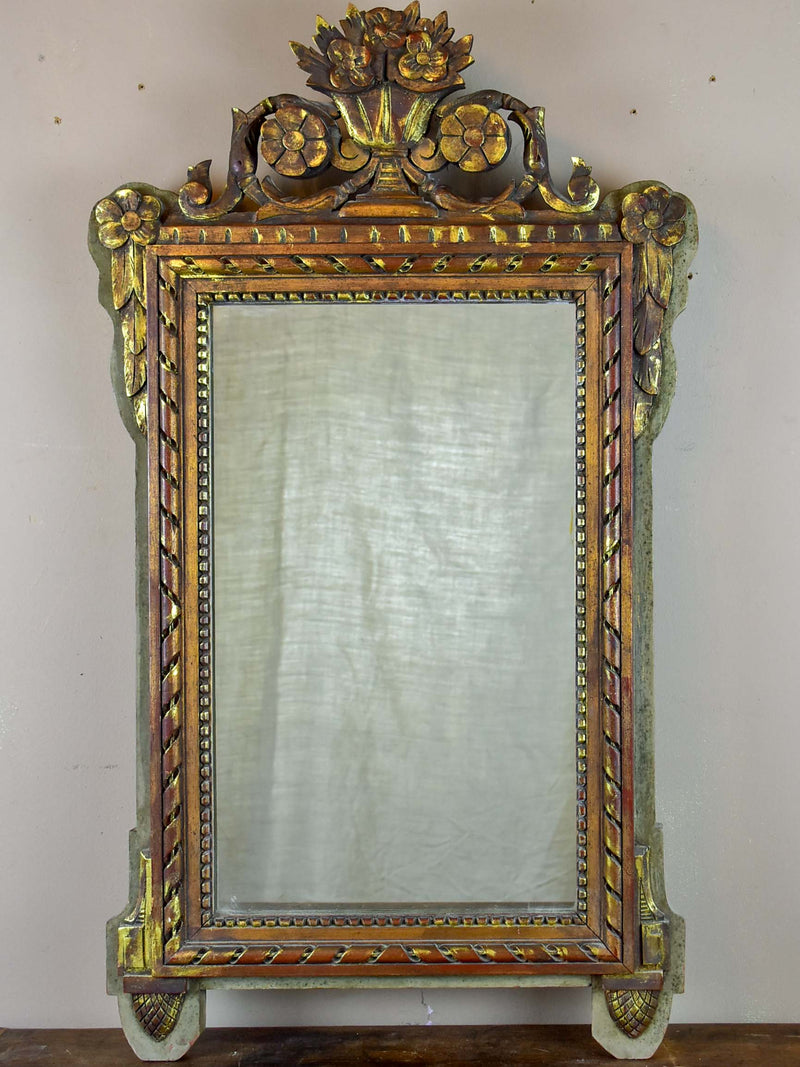19th century Louis XVI style mirror with crest 19 ¼'' x 34 ¾''