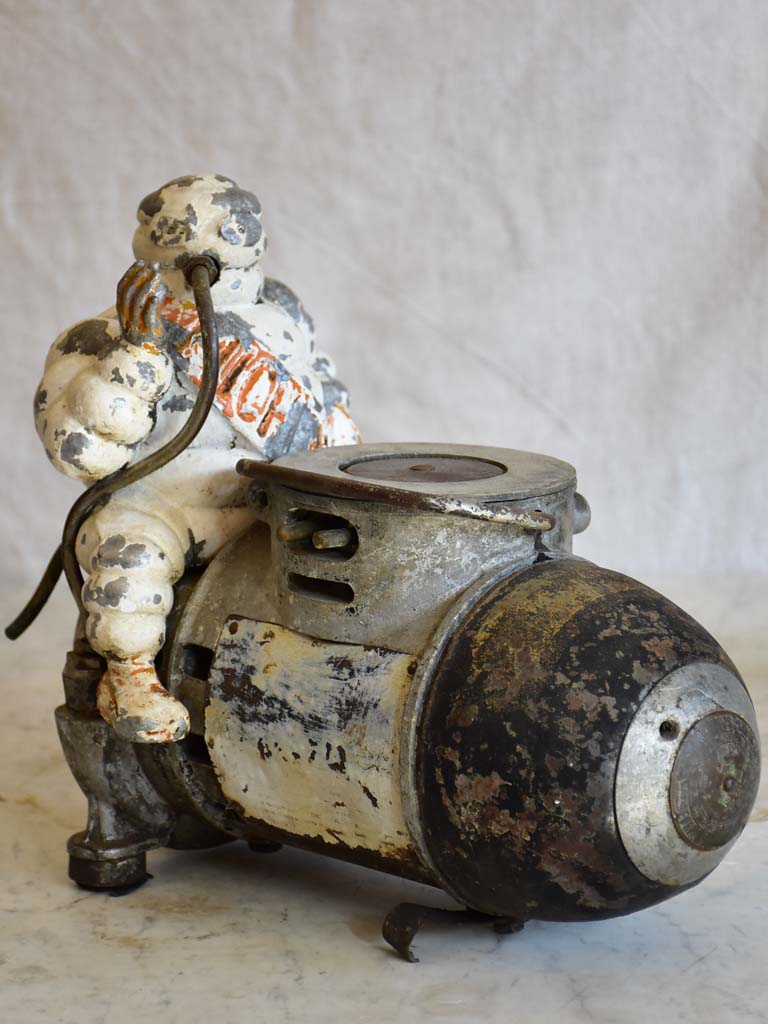Early 20th Century French Michelin man air compressor