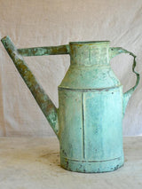 Antique French copper watering can with aqua blue patina