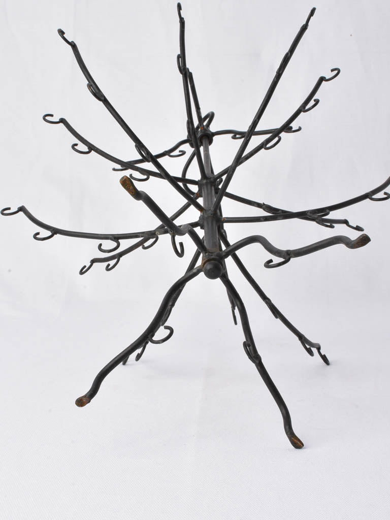 Classic patina-finished metal tree stand