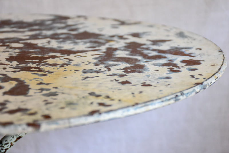 Antique French bistro table with timeworn patina - Rufier cast iron