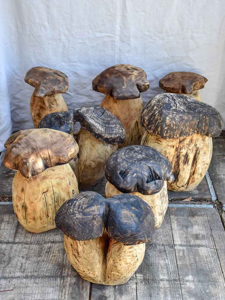 Collection of SEVEN artisan made garden stools - carved mushrooms / toadstools