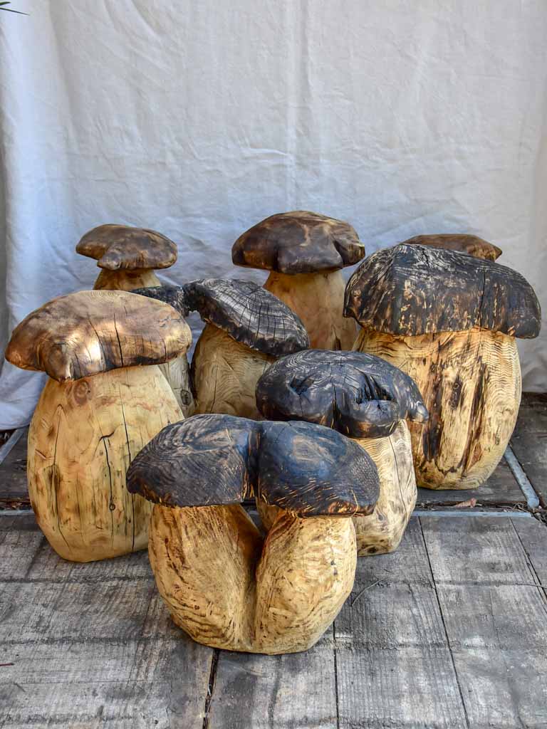 Collection of SEVEN artisan made garden stools - carved mushrooms / toadstools