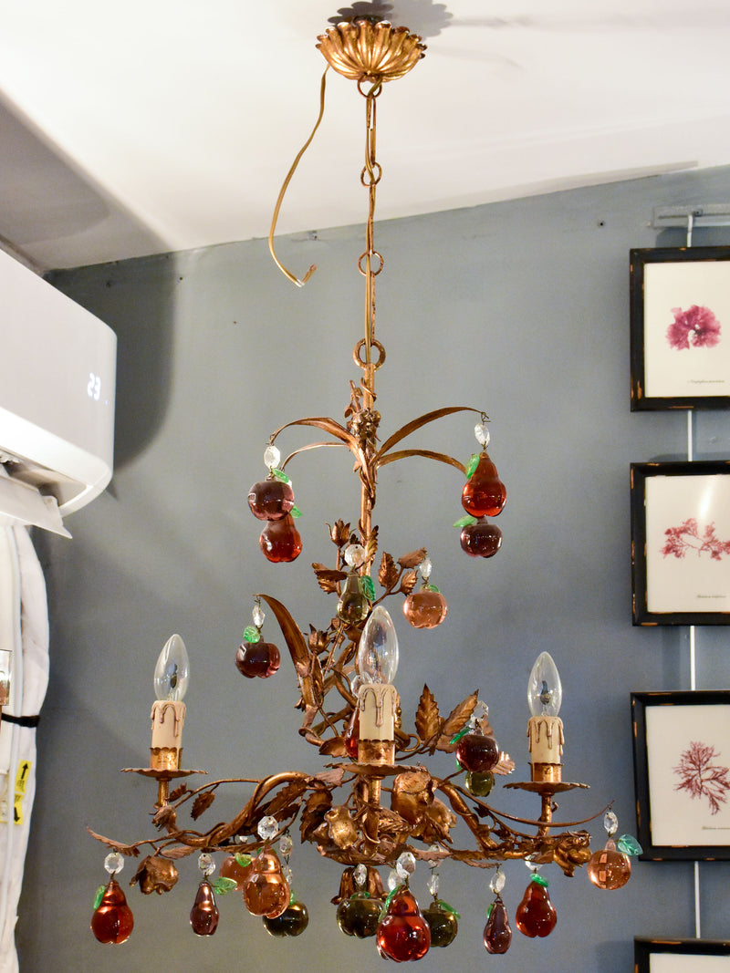 Vintage Italian chandelier with Murano glass fruits and a decorative gilded frame