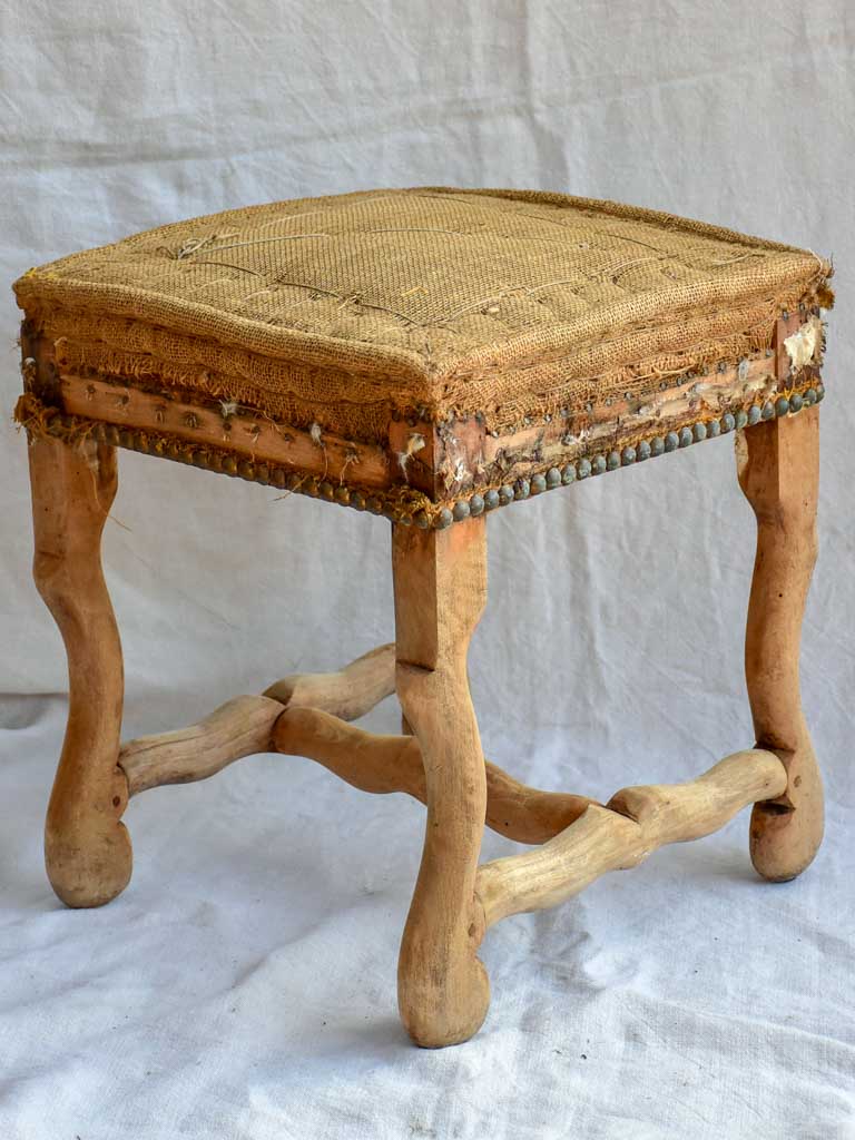 Rustic antique French stool with jute upholstery