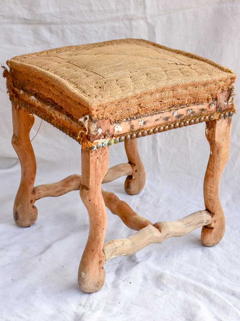 Rustic antique French stool with jute upholstery