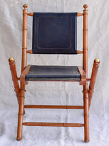 Four antique French colonial folding leather boat deck chairs