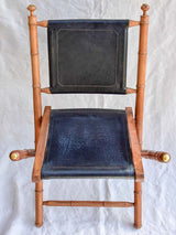 Four antique French colonial folding leather boat deck chairs