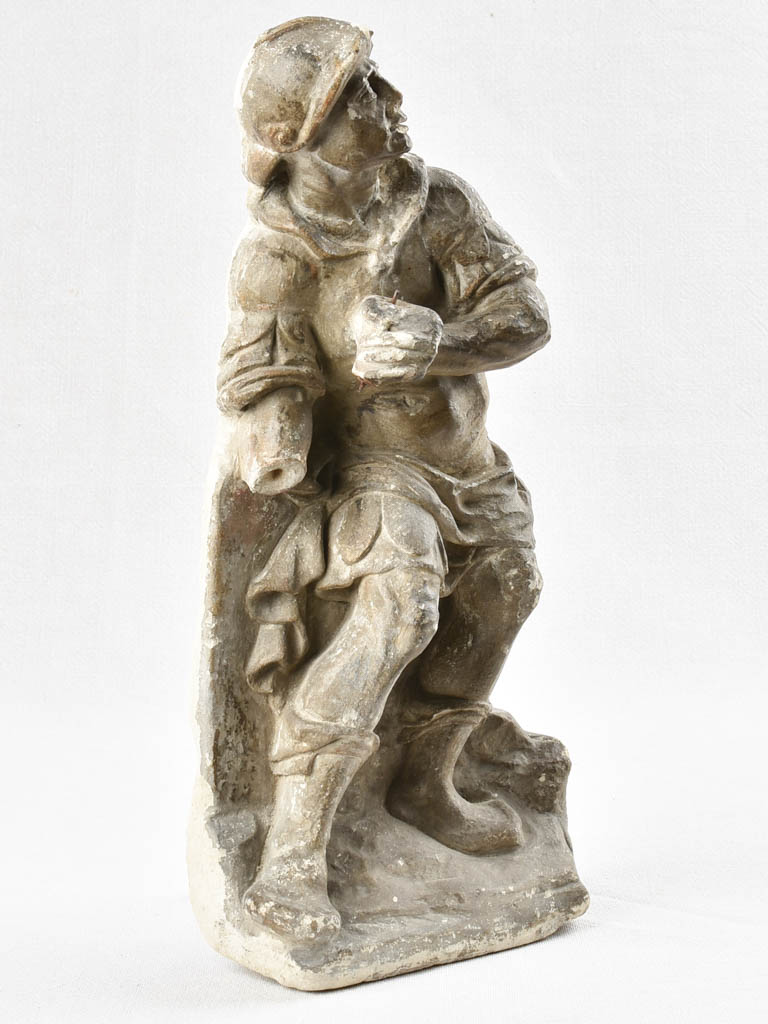 Stone sculpture of seventeenth-century warrior