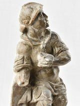Seventeenth-century stone statue missing one hand