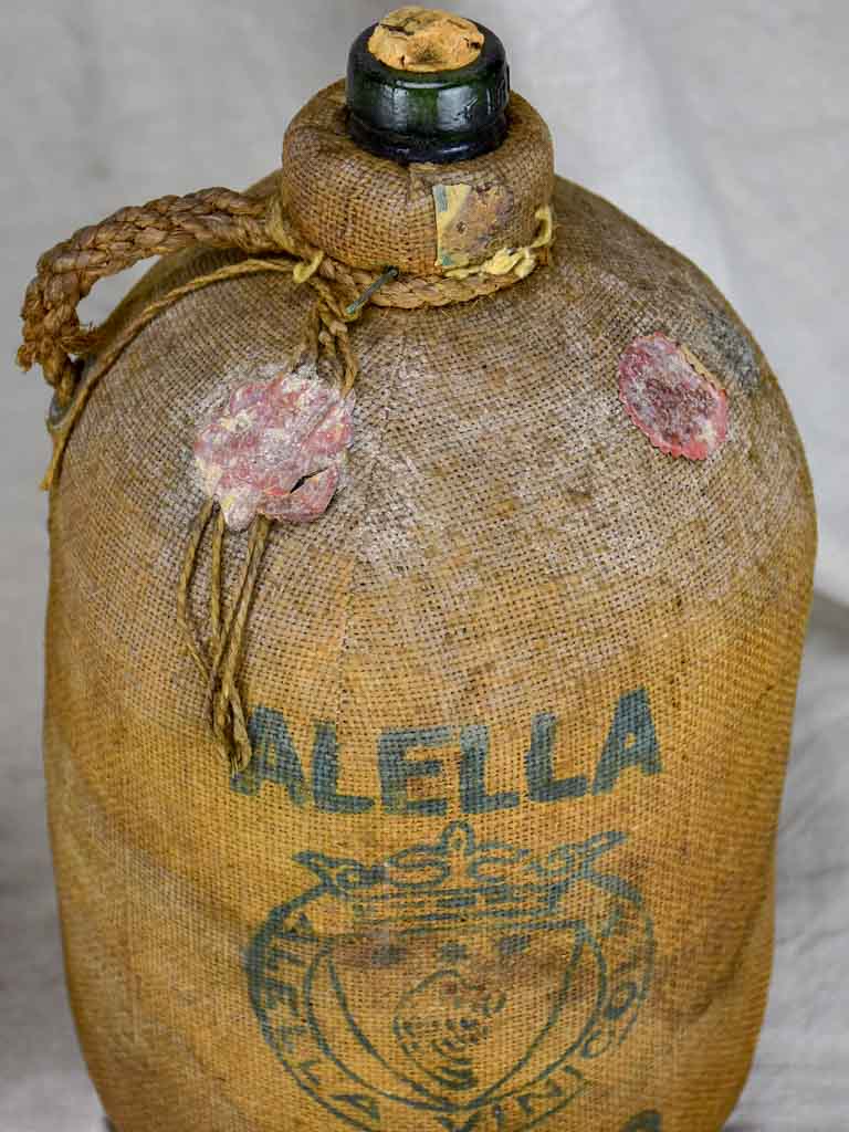 Two 19th Century Spanish wine bottles in jute