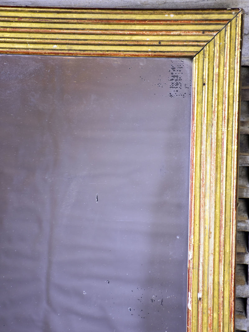 18th century Louis XVI giltwood mirror with reeded frame 33 ½'' x 32 ½''
