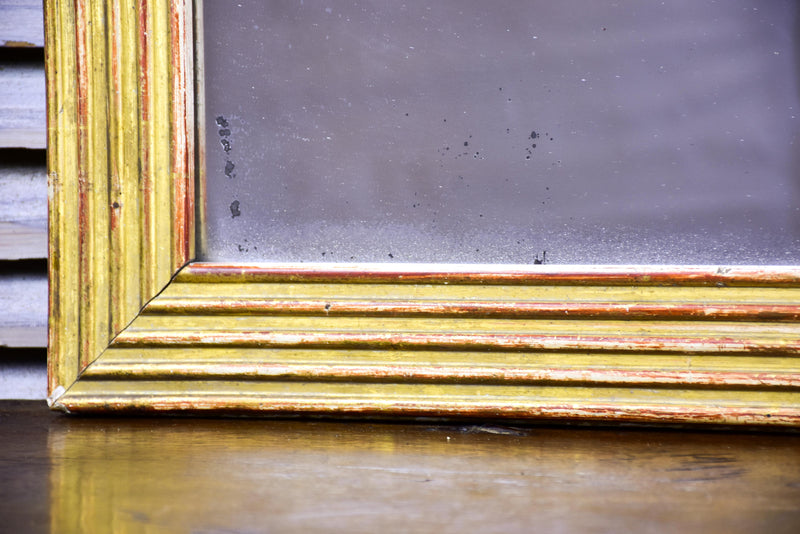 18th century Louis XVI giltwood mirror with reeded frame 33 ½'' x 32 ½''
