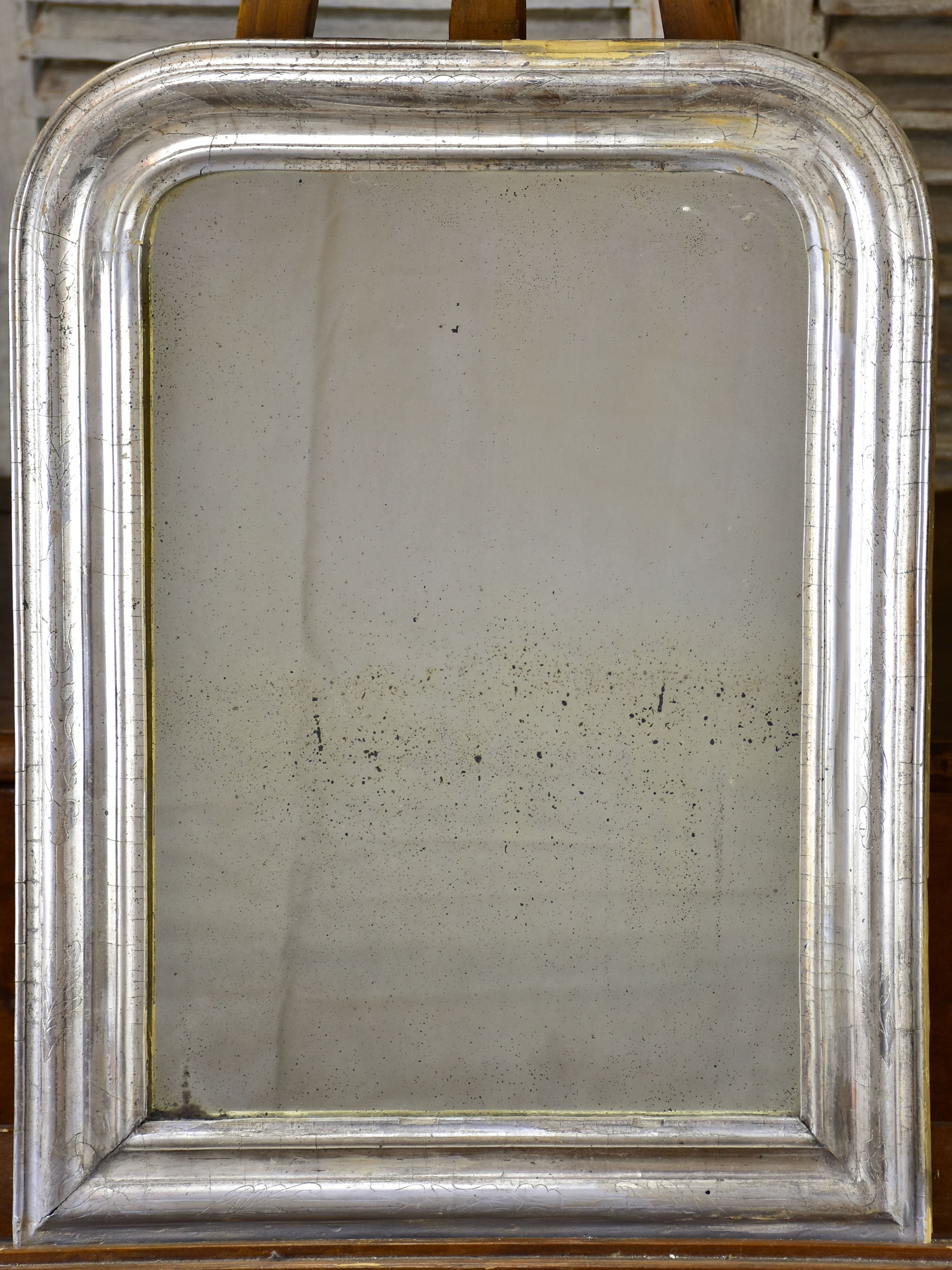 Small antique French Louis Philippe mirror with silver frame