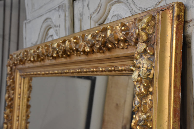 Mirror, large, gilded with decorative frame