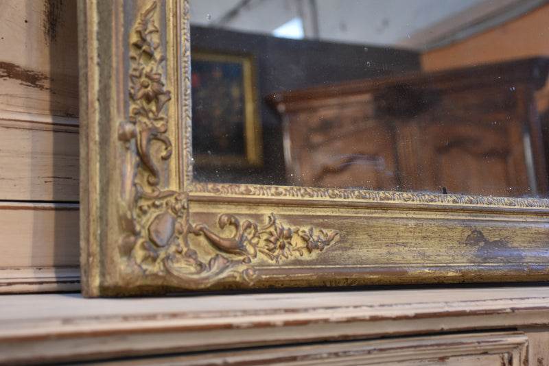 Antique French mirror with decorative frame