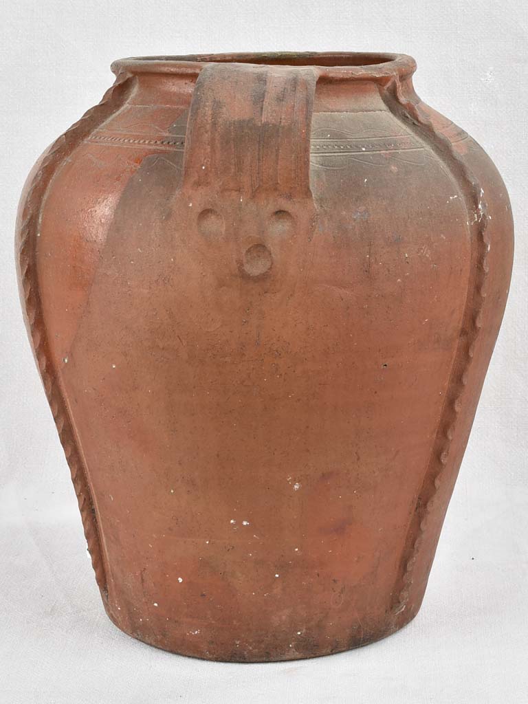 Vintage terracotta North African displayed pot