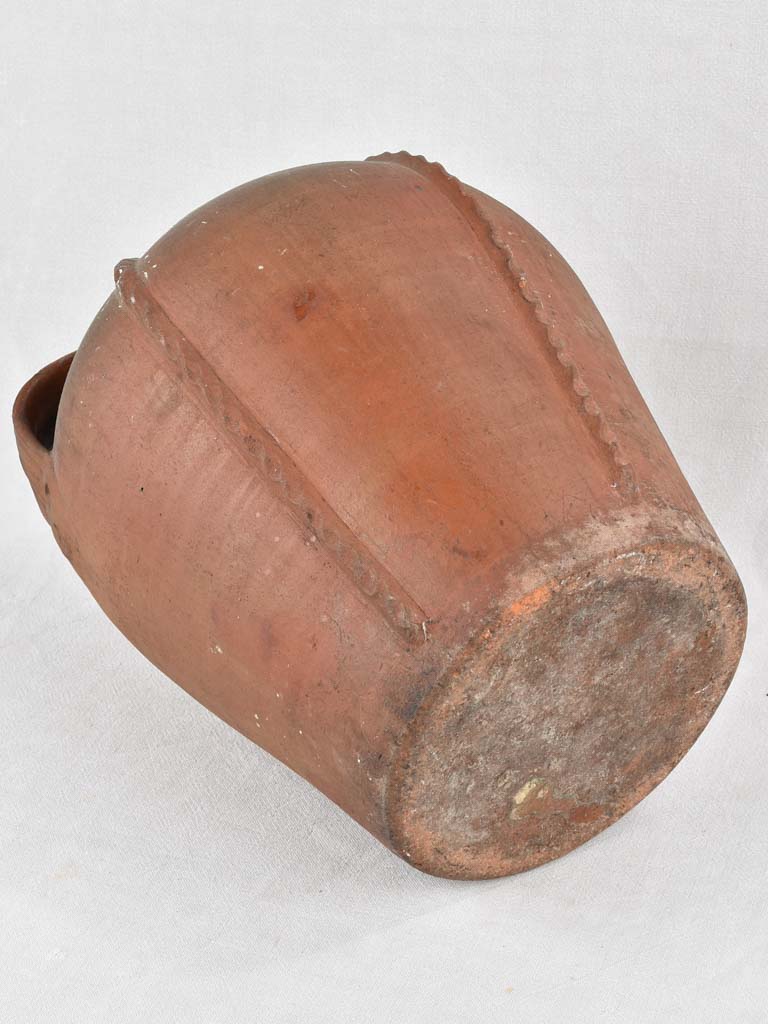 Unique terracotta antique pot with handles