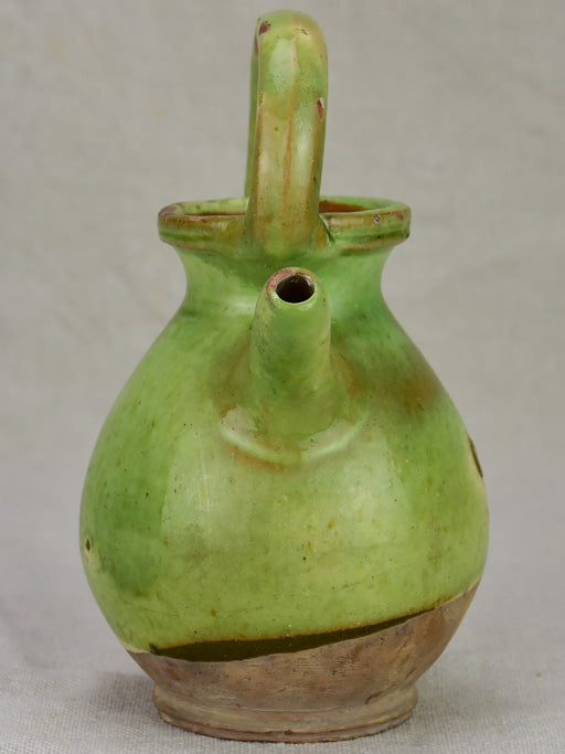 Miniature antique French water pitcher with green glaze 7½"