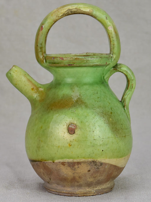 Miniature antique French water pitcher with green glaze 7½"