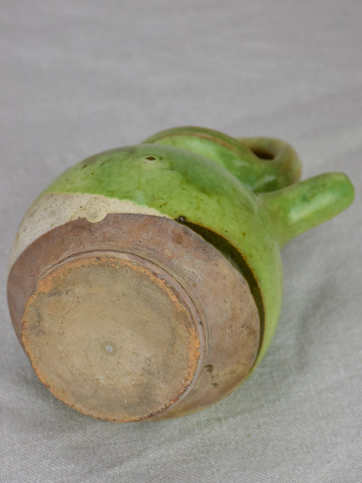 Miniature antique French water pitcher with green glaze 7½"