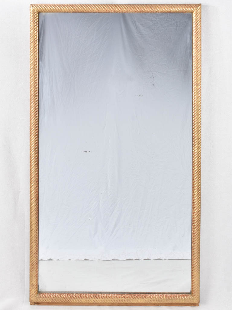Louis XVI gilded mirror with spiraling frame 32¾" x 57"