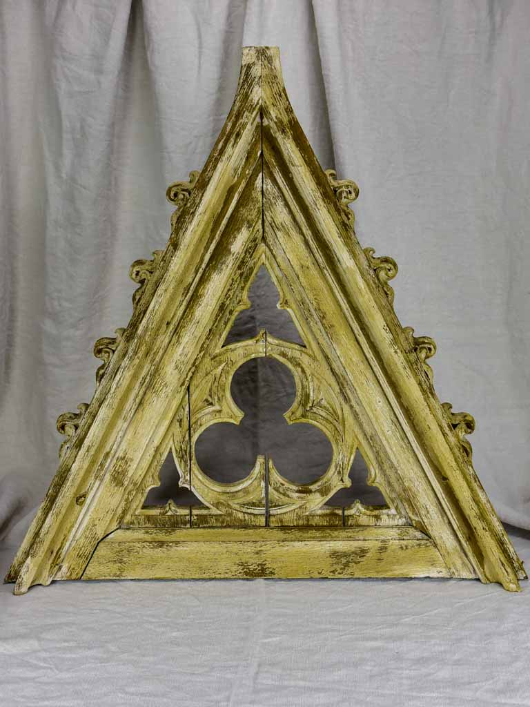 Salvaged triangular timber elements from a church organ