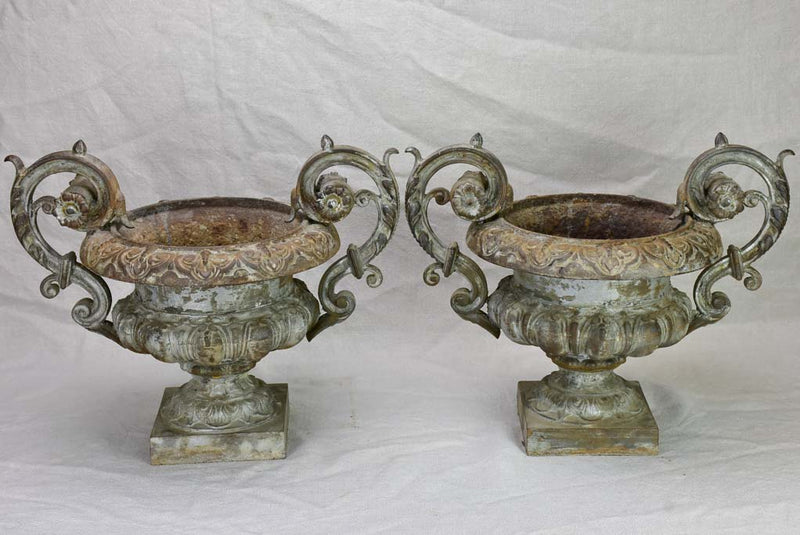 Pair of late 19th Century French Medici urns with loop handles 14½"