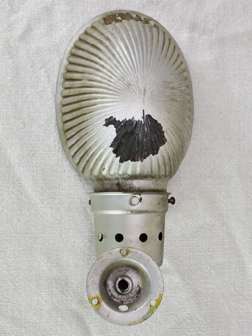 Pair of mid century holophane wall sconces from a boutique