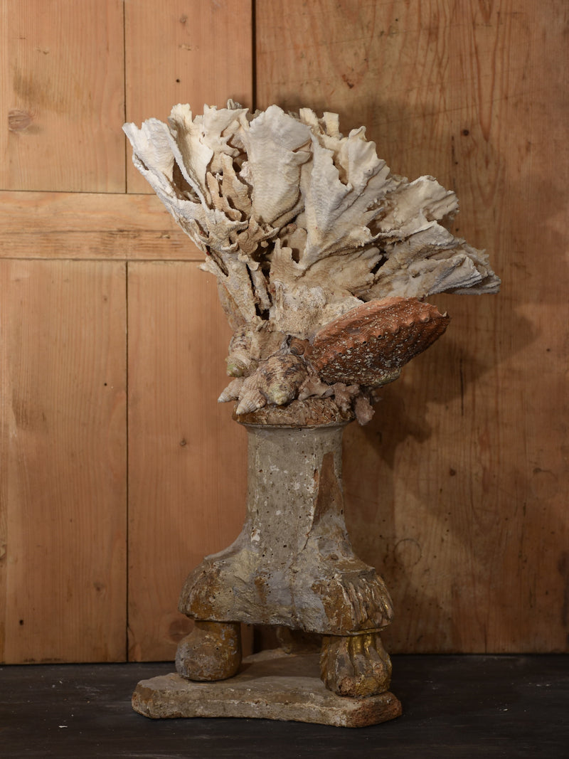 Coral and abalone shell specimens on antique base