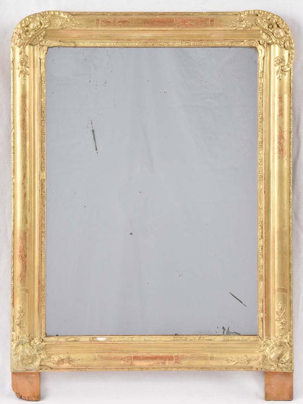 Antique gold footed tombstone mirror