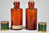 Two late nineteenth-century French apothecary jars with green tin lids 8"