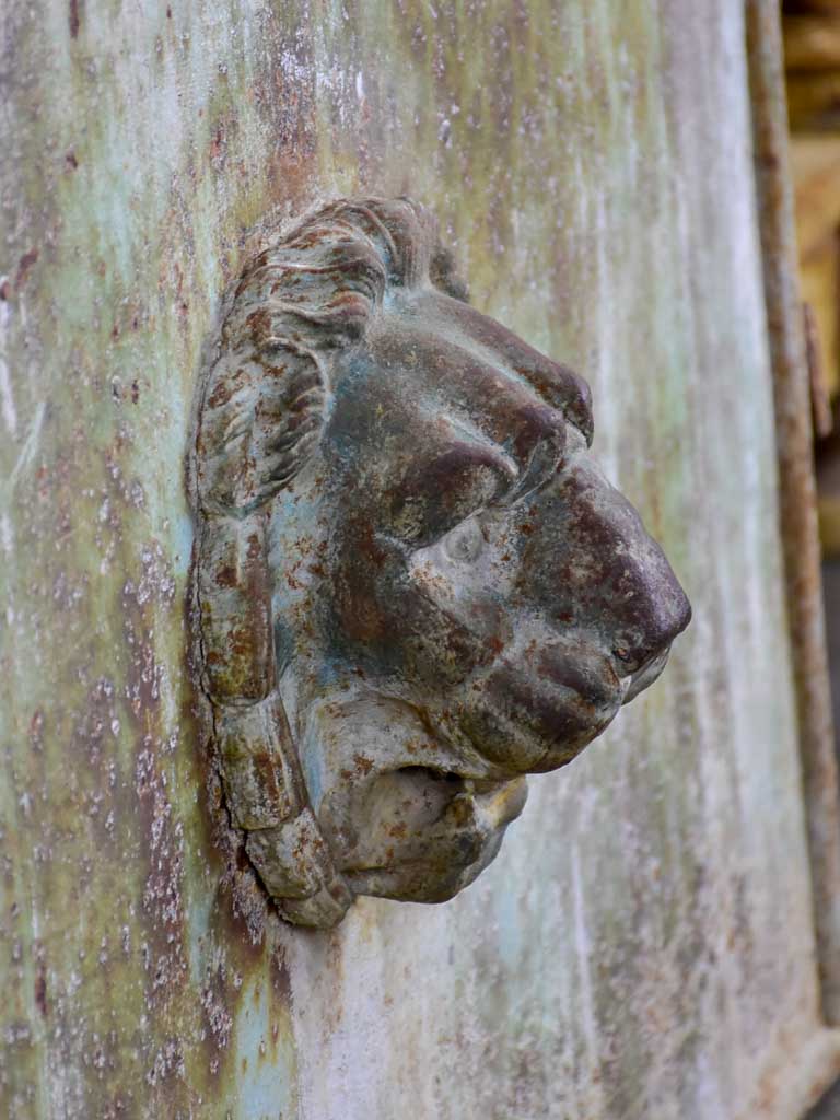 Antique French garden gate with lion's head