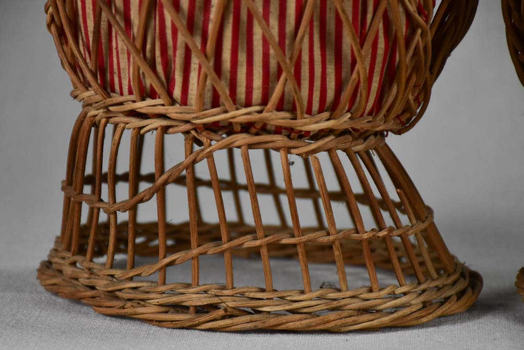 Old-fashioned wicker toy armchair pair