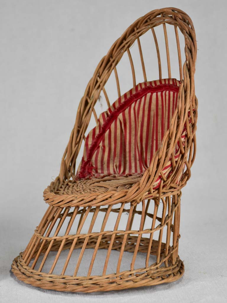 Antique well-loved wicker doll armchairs