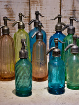 Collection of 10 antique seltzer bottles