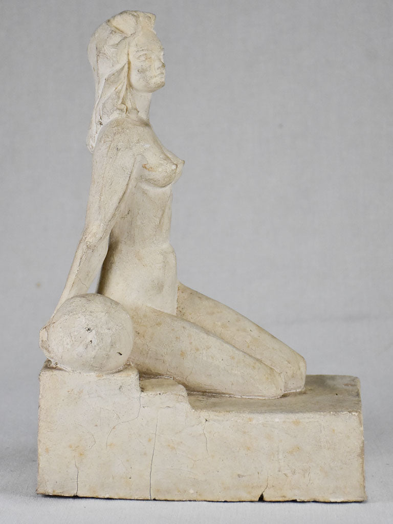 1940's plaster sculpture of a lady and a ball 12¼"