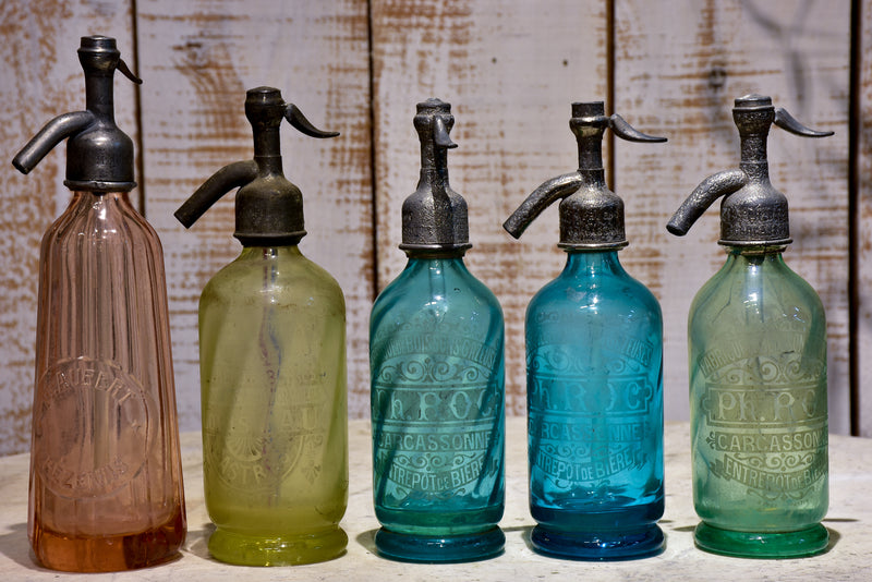 Collection of 10 antique seltzer bottles