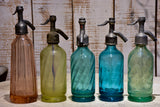 Collection of 10 antique seltzer bottles