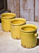 Set of three yellow glazed French pots