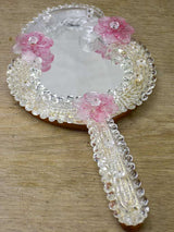 Vintage Venetian-style hand mirror with pink flowers
