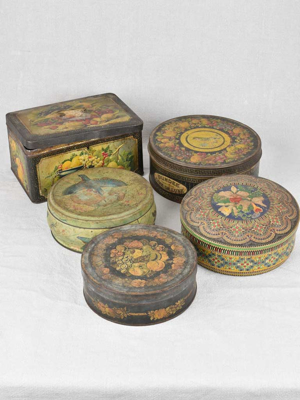 Antique floral-themed French biscuit tins