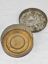 Aged flower-decorated biscuit tins collection