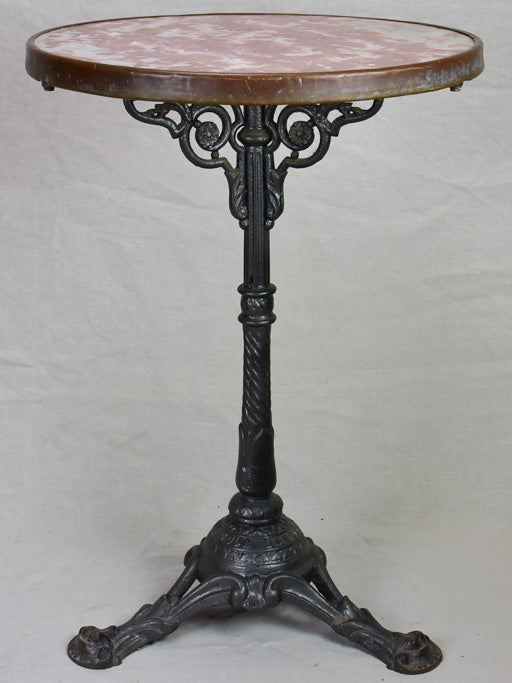 Pretty red marble and cast iron bistro table from the early 20th century
