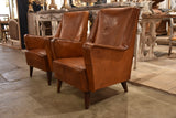 Pair of petite 1960’s leather French armchairs