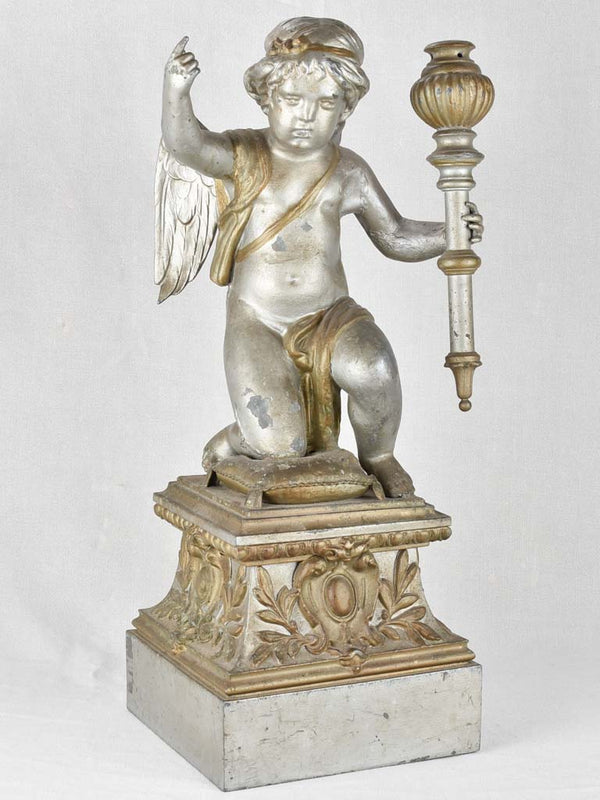 Antique zinc 19th-century cherub statue