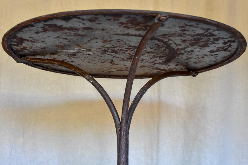 Antique French garden table with claw feet